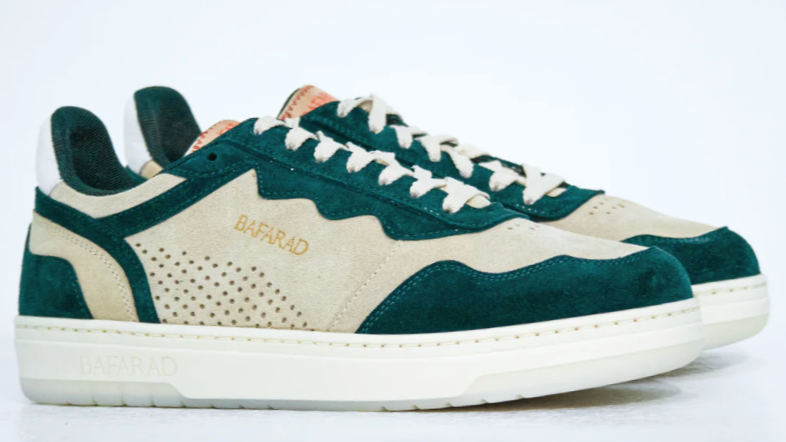 Green and white sneaker with 'Baracca' branding on a light gray background